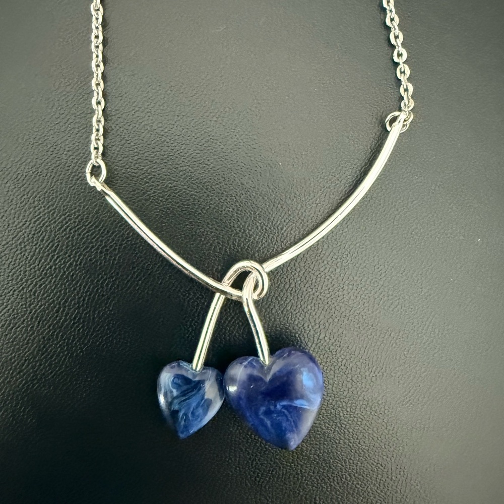 1976 Sarah Coventry Duo Heart SilverTone Necklace Two Blue marbled Heart Pendant
